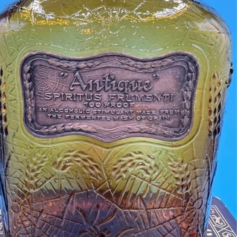 Bottle Amber Glass Embossed Spider Web Design - Picture 3 of 4